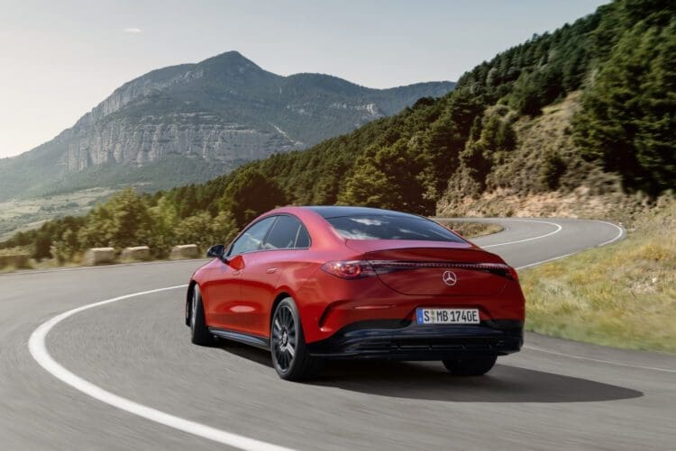 Mercedes CLA EV driving rear view