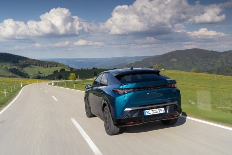 peugeot e-3008 driving through the black forest to illustrate best ev road trips