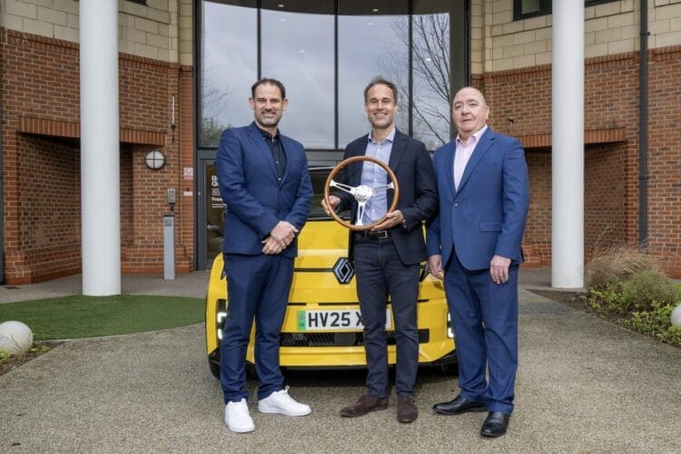 Adam Wood (centre), receives the UK Car of the Year 2026 trophy from John Challen (left) and Lee Puffett, (Photo: Barry Hayden)